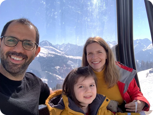 Ori with his family in a gondola above the snow
