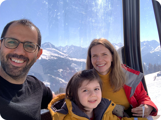 Ori with his family in a gondola above the snow